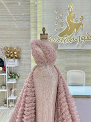 Custom-made party dress designed to flatter your figure.